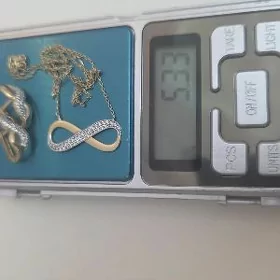 золотые серьги и подвеска